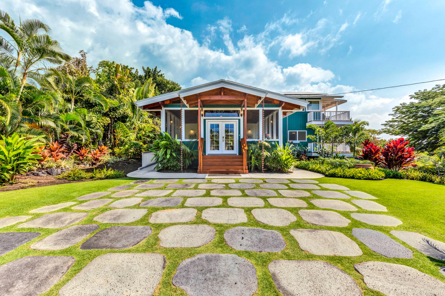 Paved stones in front one of our garden view Kona HI rentals